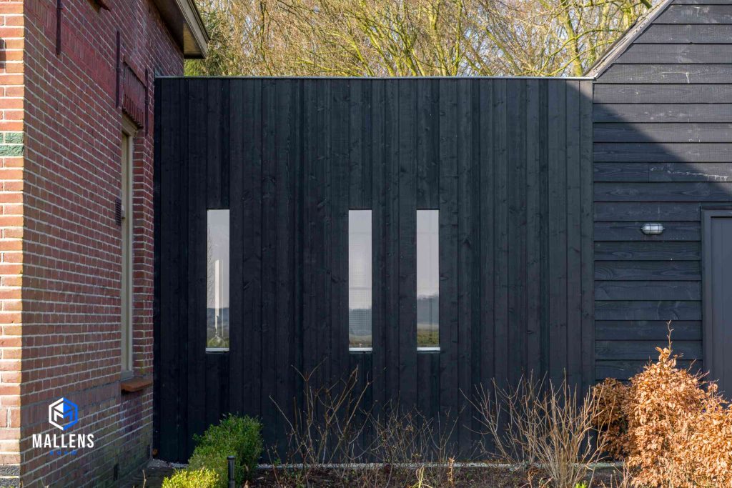 Detailfoto van het tussenstuk dat de oude Vlaamsche schuur in Helvoirt met de andere woning verbindt.
